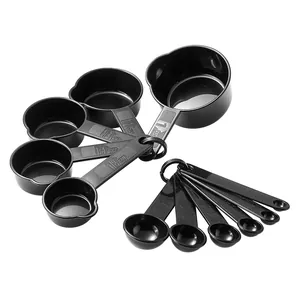Black 11-piece plastic measuring cup and spoon set for precision kitchen baking needs