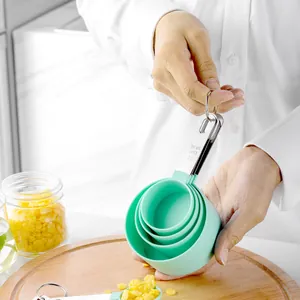 8-piece mint green baking measuring cup and spoon set with stainless steel handles