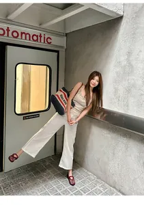 Stylish red mesh Mary Jane sandals shown in a detailed urban lifestyle setting