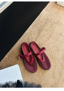 Top view of burgundy mesh Mary Jane flats with sparkling rhinestone embellishments