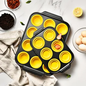 Non-stick carbon steel 12 and 6-cup muffin pans with yellow silicone liners for baking