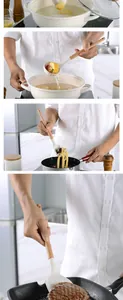 Cremefarbenes Silikon-Küchenhelfer-Set beim Kochen von Mais, Pasta und Steak.