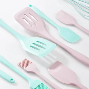 Pastel pink and mint green silicone baking tool set with spatula, brush and whisk