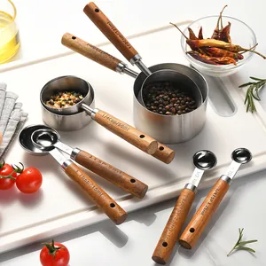 8-piece professional stainless steel measuring cup and spoon set with wooden handles