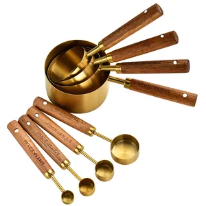 8-piece gold stainless steel measuring cup and spoon set with fine wooden handles