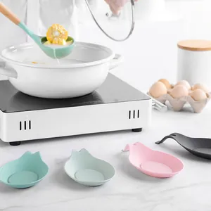 Large silicone spoon rests in various colors for kitchen soup ladle storage and organization