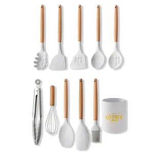 11-piece white marble silicone kitchen utensil set with natural wooden handles and bucket