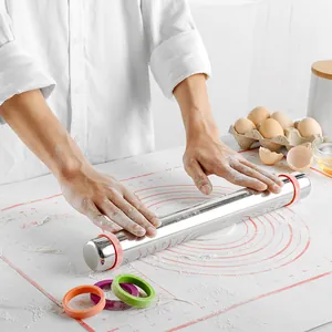 Adjustable stainless steel rolling pin with multi-colored silicone thickness rings