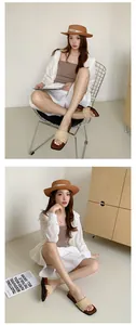 Model wearing stylish woven platform slides for women with a casual summer outfit