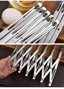 Close-up of stainless steel expandable multi-wheel pizza cutter and bread cutter for baking.
