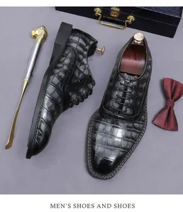 Elegant men's Oxford shoes with embossed crocodile leather texture and lace-up design.
