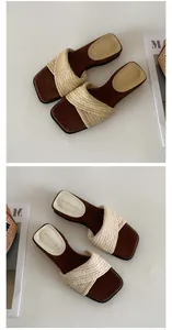 Macro view of the woven strap and soft suede footbed on French style summer slides