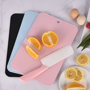 Set of non-slip PP plastic fruit cutting boards with a matching pink kitchen knife