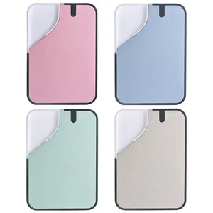 Set of wheat straw cutting boards with integrated grinders in four pastel colors