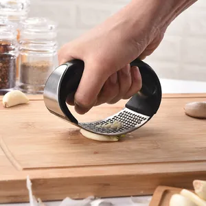 Stainless steel garlic press rocker for effortless manual mincing in the kitchen
