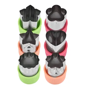 Stainless steel vegetable and cookie cutter set with colorful handles for creative baby food shapes