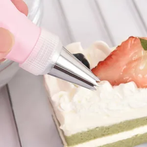Professional stainless steel piping tip set with pink silicone bag for cake decorating