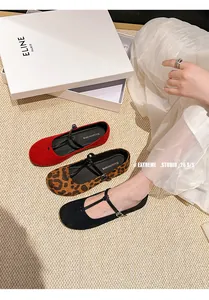Detailed view of French retro round-toe Mary Jane flats in red, leopard print, and black