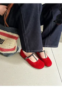 Elegant red suede Mary Jane shoes with vintage T-strap design for a classic French style look
