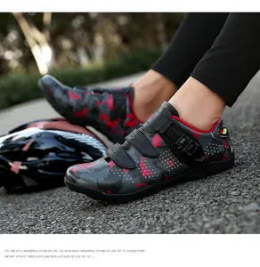 Detail view of men's camouflage mountain bike cycling shoes with buckle closure