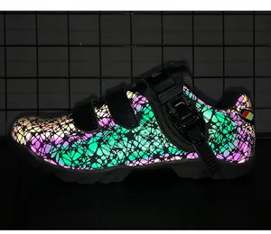 Reflective mountain cycling shoe featuring a colorful web pattern and ratchet buckle