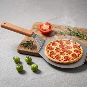 Large stainless steel pizza peel with ergonomic wooden handle and secure rivets for baking