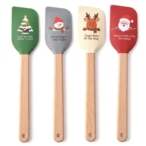 Set of 4 Christmas silicone spatulas with festive prints and natural beech wood handles