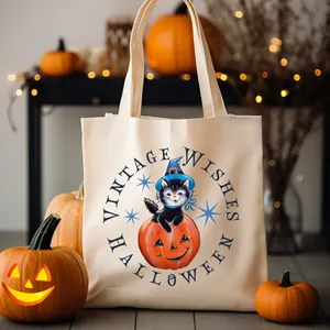 Vintage style Halloween canvas tote bag featuring a cute cat on a pumpkin print detail view.