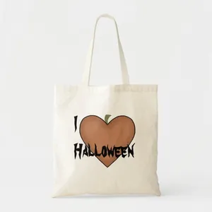 Detail showing the 'I Heart Halloween' pumpkin design on a canvas tote bag.