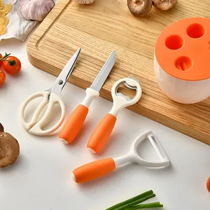 Oranje 5-delige roestvrijstalen keukenhulpset met dunschiller, mes, schaar en houder