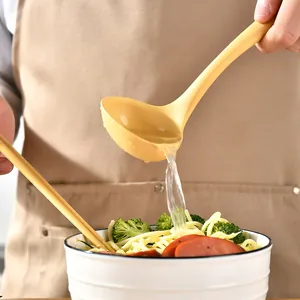 High-quality two-piece yellow silicone soup ladle and chopsticks set for delicious ramen