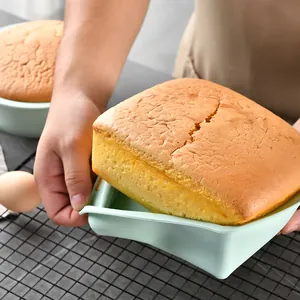Square silicone cake mold for baking sponge cake in oven, non-stick flexible design.