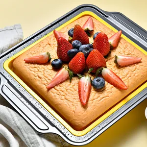 Professional square silicone cake mold with yellow non-stick liner and fruit cake