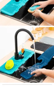 Flexible silicone faucet splash guard mat detail showing water drainage in kitchen sink