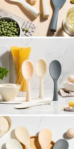 Details of non-stick silicone rice paddles standing vertically in a modern kitchen