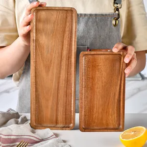Two sizes of handcrafted rectangular acacia wood trays for food serving and home storage
