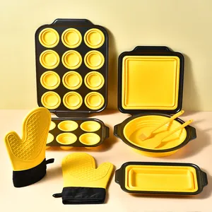 8-piece yellow silicone folding baking set with muffin pans and oven mitts