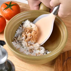 Heat resistant non-stick silicone rice spoon with durable stainless steel handle