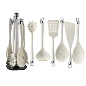 7-piece cream silicone kitchen utensil set with hanging stand and silver accents
