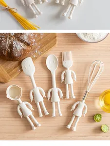 White silicone kitchen utensil set with cartoon character handles for fun DIY baking