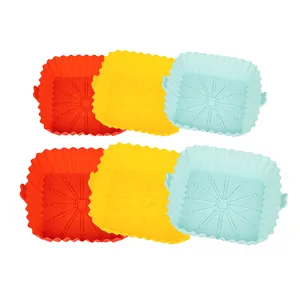 Set of six reusable square silicone air fryer liners in red, yellow and mint blue
