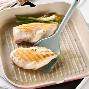 Heat-resistant mint green silicone spatula with non-stick square grill pan