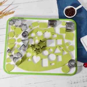 Premium 24-piece stainless steel cookie cutter set with various geometric shapes for baking