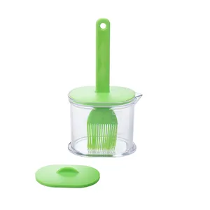 Green silicone oil dispenser bottle with brush and measurement scale for BBQ and kitchen