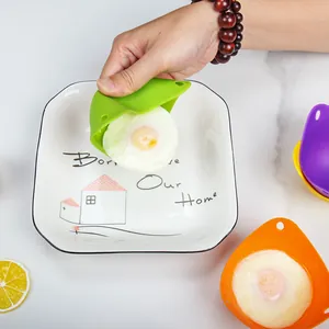 Vibrant high temperature resistant silicone egg poacher cups for easy poached eggs.