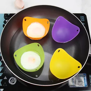 Heat-resistant silicone egg poacher cups in four vibrant colors for poached eggs