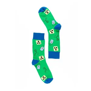 Detail of green mid-calf socks with radioactive and chemistry themed science patterns