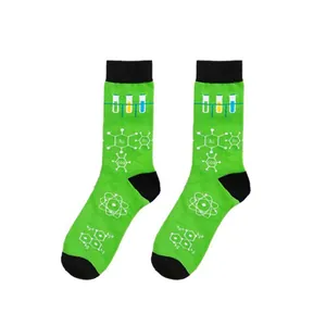 Detail view of green science themed socks with test tube and chemical formula patterns