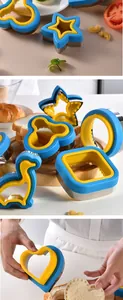 Set of cartoon bread and cookie cutters with protective plastic grips for kids food
