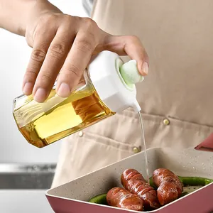 Press type glass oil dispenser with silicone brush for precise oil control in kitchen
